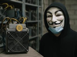 Mineradora de bitcoin ASIC com Anonymous ao lado